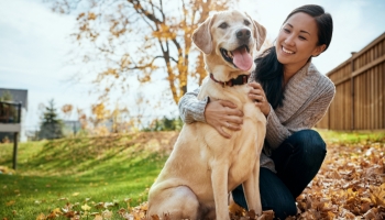 A woman enjoys a moment with her dog